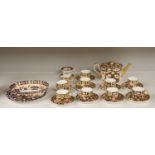 Six Royal Crown Derby coffee cups and saucers and teapot and stand
