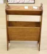An early 20th century oak book/paper stand, height 60cm