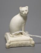 A Rockingham biscuit porcelain seated cat, c.1830, height 5cmCONDITION: ex Dennis G. Rice