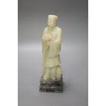 A Chinese soaptone carved figure of a sage, 25.5cm high including stand