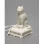 A Rockingham biscuit porcelain seated cat, c.1830, height 5cmCONDITION: ex Dennis G. Rice