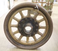 An Edwardian iron and wood cart wheel, diameter 55cm
