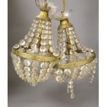 A pair of 20th century brass cut glass ceiling lights