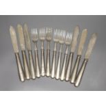 A set of six pairs of George V silver fish eaters, George Howson, Sheffield, 1919/1920, knife 21.