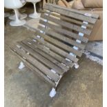 A small slatted cast iron garden bench, length 76cm, depth 80cm, height 75cm