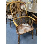 A set of eight 19th century and later Yorkshire area yew, elm and ash Windsor armchairs