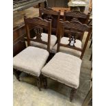 A set of four late Victorian walnut dining chairs