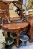 A Victorian mahogany 'D' shaped "Duchess" dressing table, width 90cm, depth 40cm, height 129cm