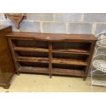 A Victorian mahogany open shelved bookcase, with bowfront centre section, length 150cm, height 31cm