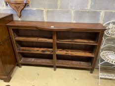 A Victorian mahogany open shelved bookcase, with bowfront centre section, length 150cm, height 31cm