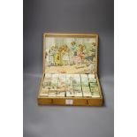 A Victorian chromo-lithographed building block set in original case.
