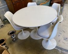 A Saarinen-designed Tulip table and four chairs, 120cm diameter, height 78cm