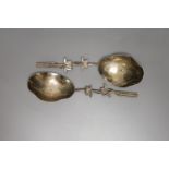 A pair of early 20th century Chinese white metal spoons, with foliate stems, by Wang Hing, 19.3cm, 3