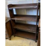 An early 20th century Wylie and Lochead style oak open bookcase, length 95cm, depth 26cm, height