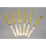 A set of six late 19th century Russian carved mother of pearl handled gilt 84 zolotnik tea knives,