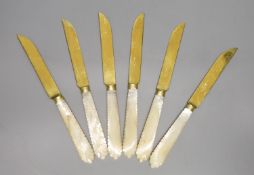 A set of six late 19th century Russian carved mother of pearl handled gilt 84 zolotnik tea knives,
