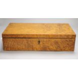 A fine quality 19th century amboyna toilet box / writing slope, length 45cm containing ivory