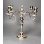 A silver plated four branch five light candelabrum, height 36cm