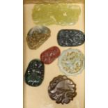 Seven Chinese jadeite and hardstone plaques, widest 9cm