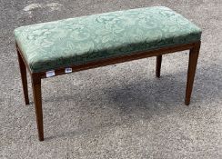 A George III style dressing stool, with blue floral brocade upholstery, length 90cm, depth 40cm,