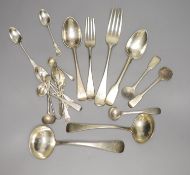A set of six silver coffee spoons and sundry silver flatware including a George IV sauce ladle, 14.5