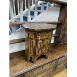 A Moorish octagonal mother of pearl inlaid work table, width 50cm, depth 33cm, height 56cm