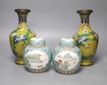 A pair of 20th century Chinese export ginger jars, decorated with vignettes of landscapes over a