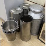 Three stainless steel cylindrical food containers, a galvanised steel churn and four stainless steel