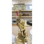 A large moulded gilt putti table lamp, height 70cm excl. light fitting