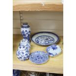 A group of Chinese blue and white vases and plates, 18th century/ 19th and a Japanese shaped dish