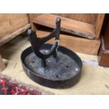 A Victorian cast iron boot scraper, 33 x 25cm