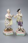 A pair of 19th century German porcelain figures, height 25cm