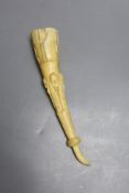 A 19th century West African tusk cup, length 22cm
