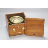 A mahogany cased brass marine compass on gimbal, marked F Smith & Son, Southampton.