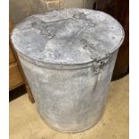 A large Victorian circular galvanised lidded barrel, 66cm high, 58cm diameter