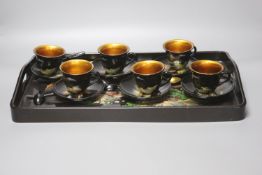 A Chinese papier mache teaset on tray