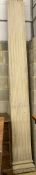 A pair of painted pine classical fluted wainscot columns, width 33cm, height 294cm