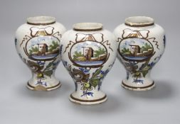 A set of three Dutch Delft baluster jars, first half 18th century, height 14cm