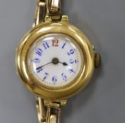 A lady's early 20th century continental 18c yellow metal manual wind wrist watch on gold plated