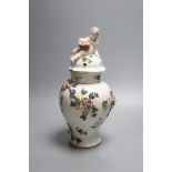 A late 18th century German porcelain pot pourri vase and cover, in Meissen style, height 32cm