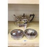 A three piece plated teaset, a pair of coasters and a shell salt