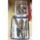 A collection of plated flatware