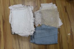 A large collection of table linen including drawn thread work, tape lace, cutwork and crochet