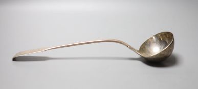 A Victorian silver fiddle pattern soup ladle, with engraved crest, William Smily, London 1862, 34.