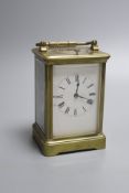 A 19th century brass hour repeating carriage clock by Henri Jacot, height 15cm with handle down