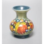 A small Moorcroft flambe leaf and berry vase, height 9cm