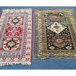 A Caucasian blue ground rug, 141 x 105cm together with one other rug, 57 x 85cm