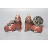 A pair of unusual Chinese copper red glazed 'pig' incense burners/ joss stick holders, late Qing