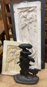 A pair of rectangular cast plaster plaques, larger 59cm high, 22cm wide together with a Victorian