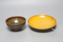 A Chinese amber-glazed pottery dish, Liao dynasty: and a jianyao hare's fur teabowl, possibly